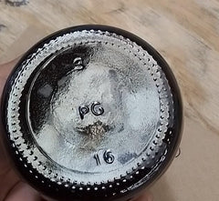 Close-up of Amenazel bottle