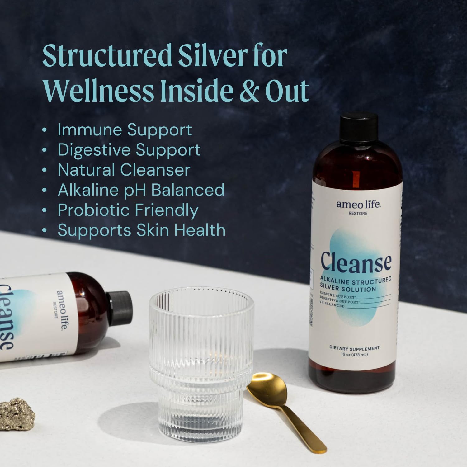 Pouring Ameo Life Colloidal Silver Liquid into a glass