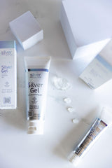 American Biotech Labs Silver Gel-on-cut illustrates protective, gentle care for minor injuries.
