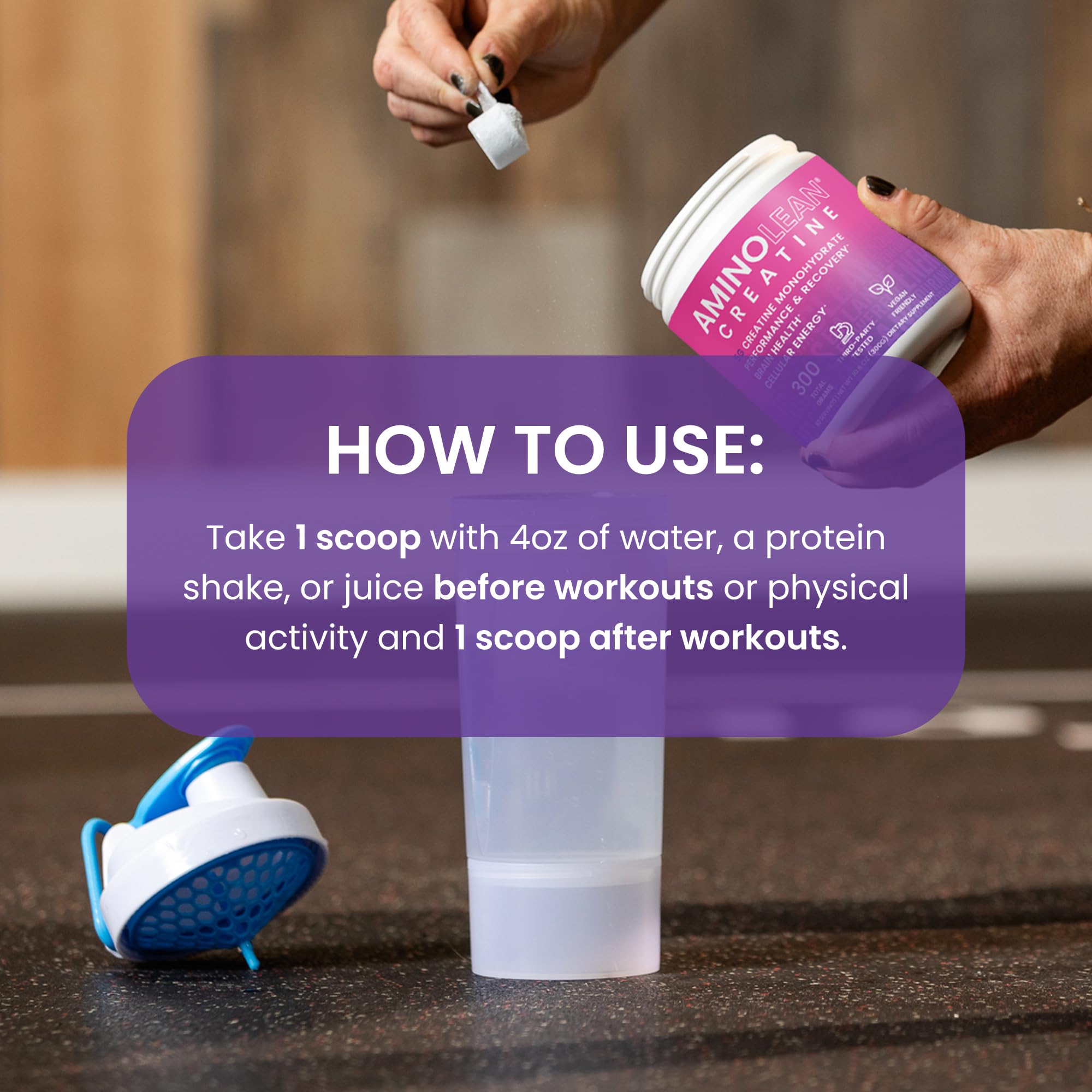 Scooped creatine powder next to a glass of water
