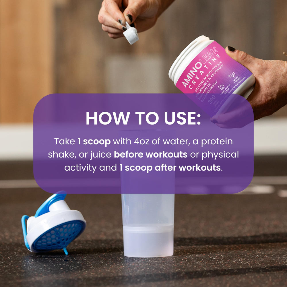 Scooped creatine powder next to a glass of water