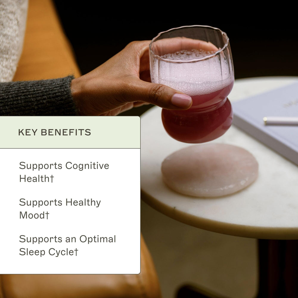Mixed berry flavored NeuroCalm Mag scoop in water