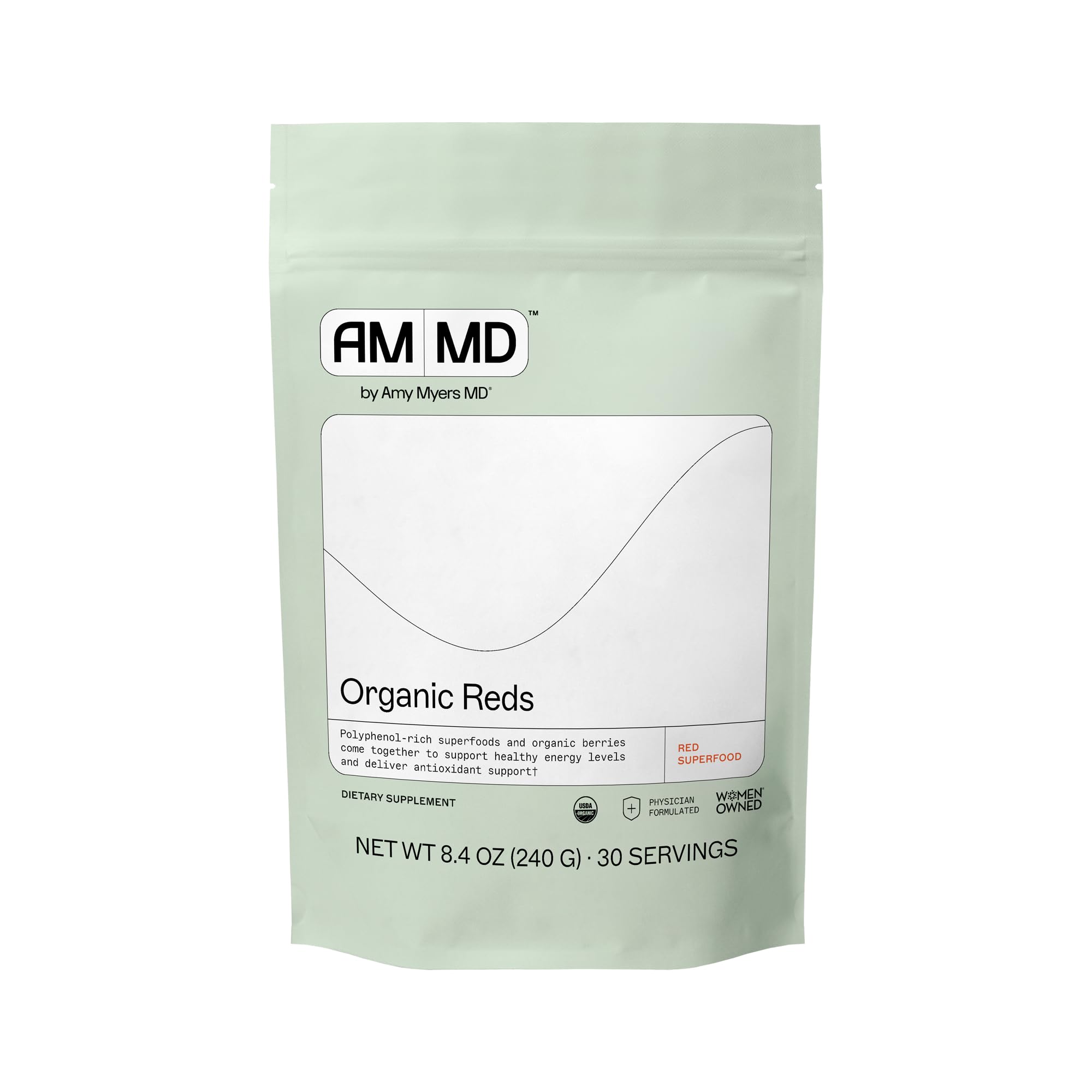Bottle of Amy Myers MD Organic Reds Superfood Powder with a scoop