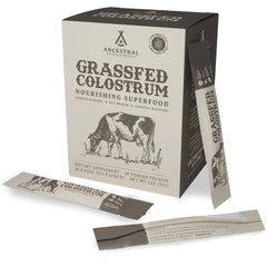 Ancestral Supplements grass-fed colostrum packet ready for on-the-go use.