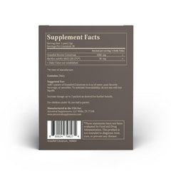 Close-up of colostrum packet highlighting convenient single-serve format.