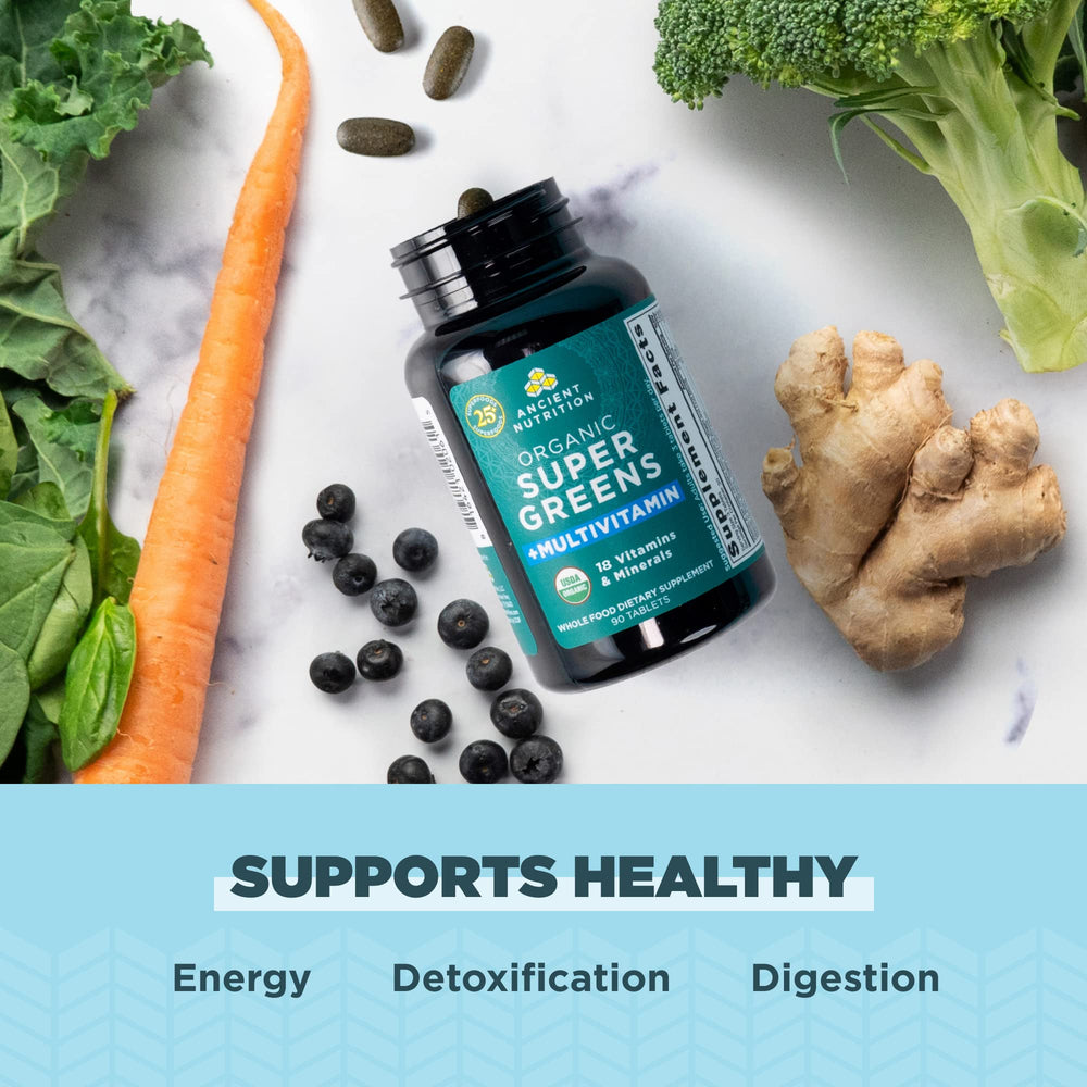 Ancient Nutrition Supergreens tablets held in hand for convenient wellness on the go