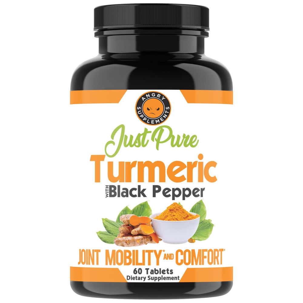 Close-up of turmeric root and black pepper capsules for four-month wellness