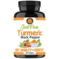 Close-up of turmeric root and black pepper capsules for four-month wellness