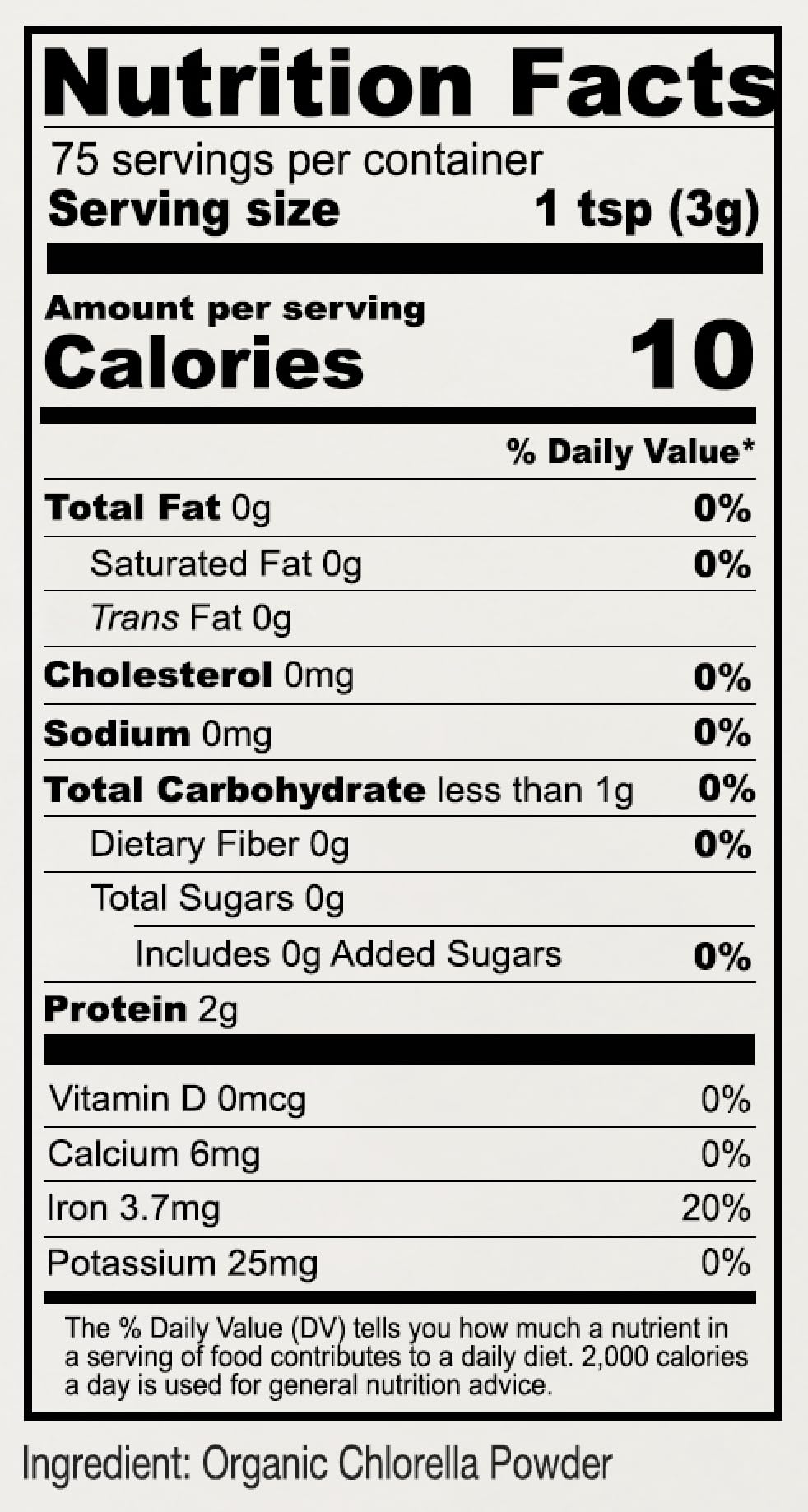 Close-up of ingredients and vegan symbol on chlorella powder