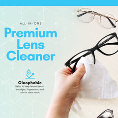 Close-up of wet wipe cleaning eyeglasses
