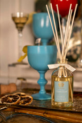 Close-up of elderflower aroma notes with diffuser bottle