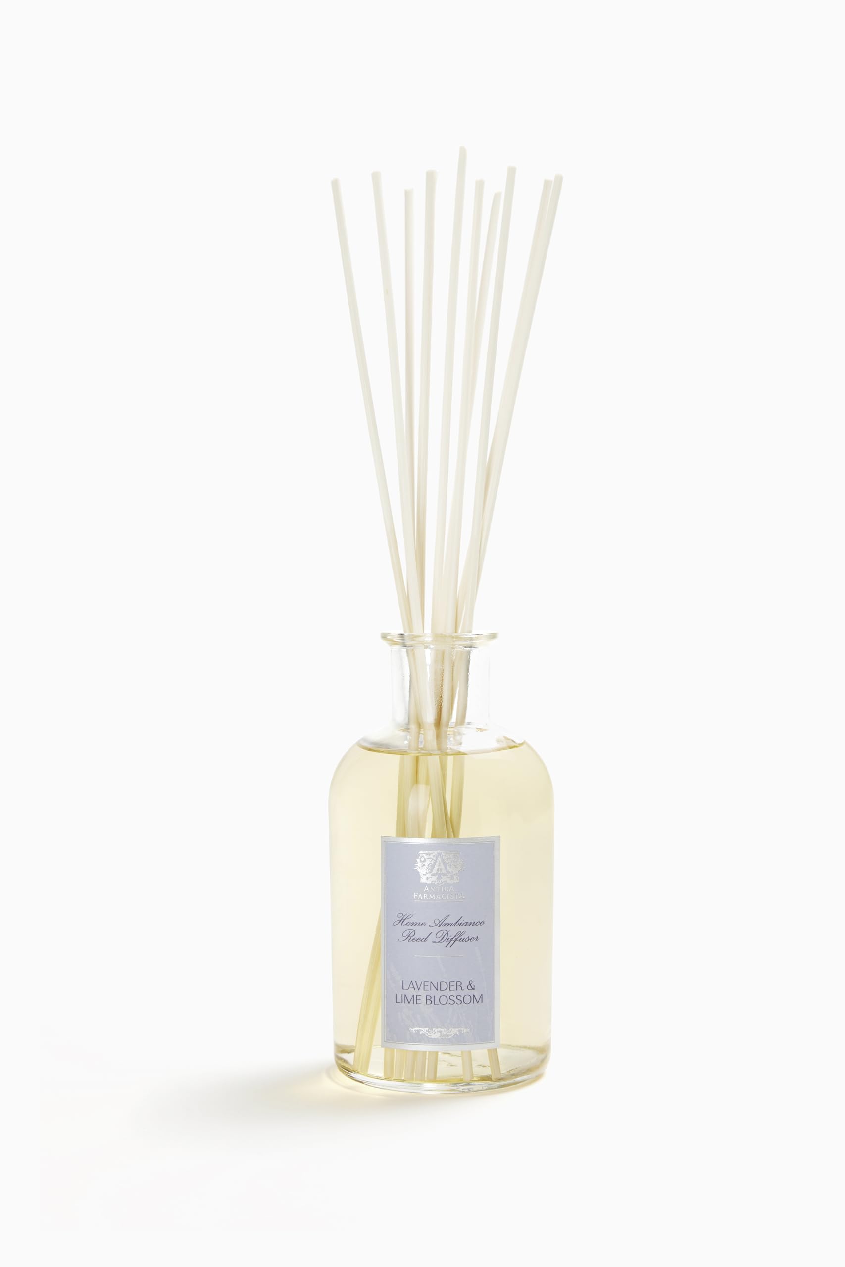 Antica Farmacista Home Ambiance Diffuser with Lavender & Lime Blossom in a 16.9 oz glass bottle with reeds