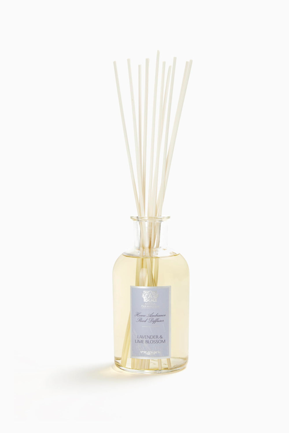 Antica Farmacista Home Ambiance Diffuser with Lavender & Lime Blossom in a 16.9 oz glass bottle with reeds