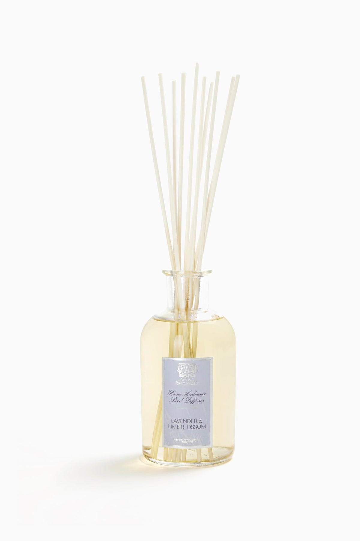 Antica Farmacista Home Ambiance Diffuser with Lavender & Lime Blossom in a 16.9 oz glass bottle with reeds