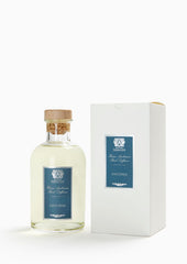 Close-up of diffuser reeds and Santorini bottle