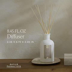 Close-up of Warm White diffuser bottle with signature reeds