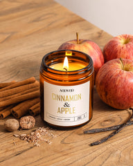 Lit AOOVOO Apple Cinnamon candle creating warm ambience