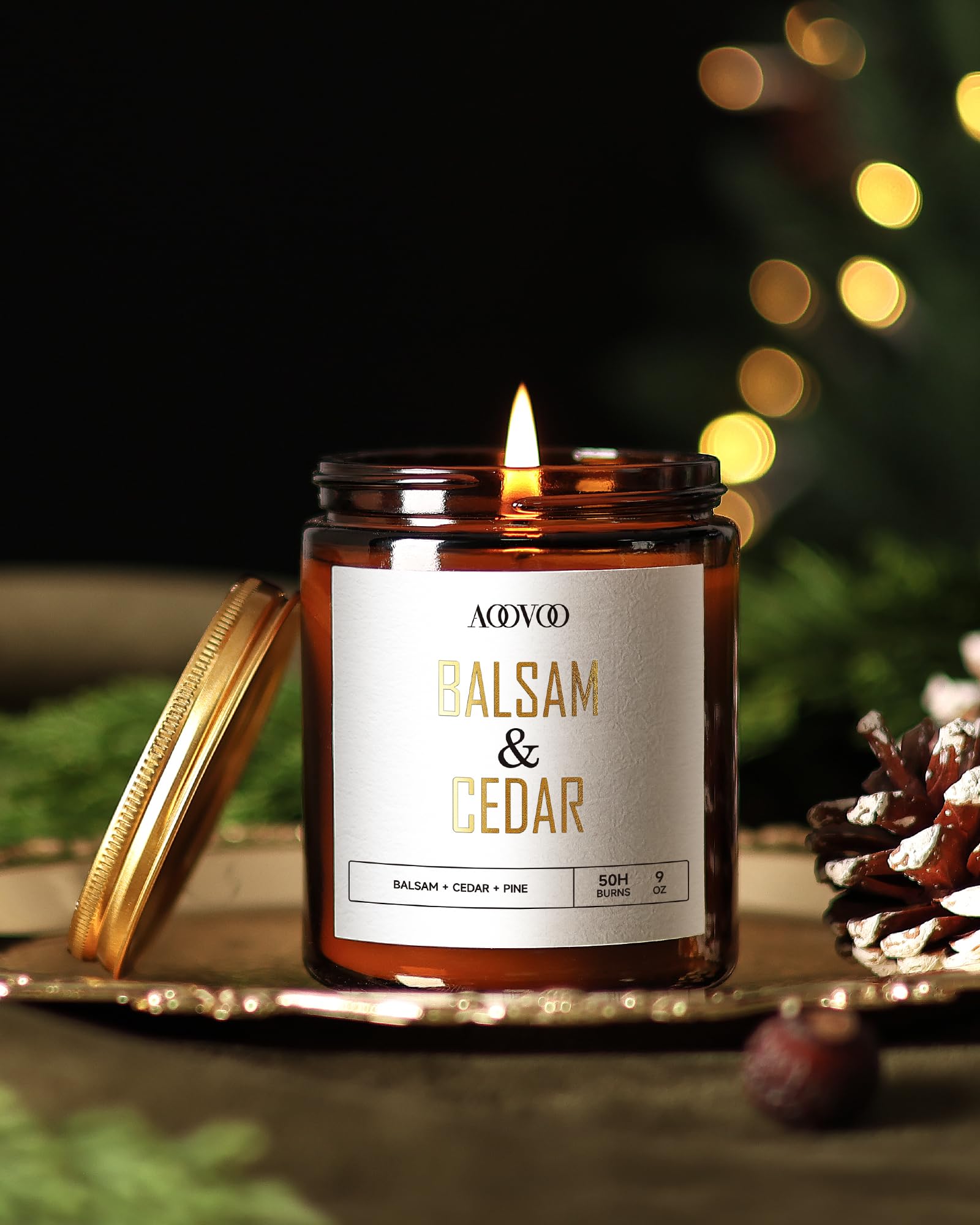 Close-up of AOOVOO candle label with gold text
