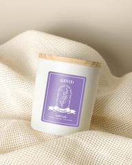 Close-up of lavender candle with dried flowers
