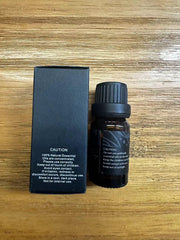 Close-up of Aphrosmile Myrrh essential oil drops
