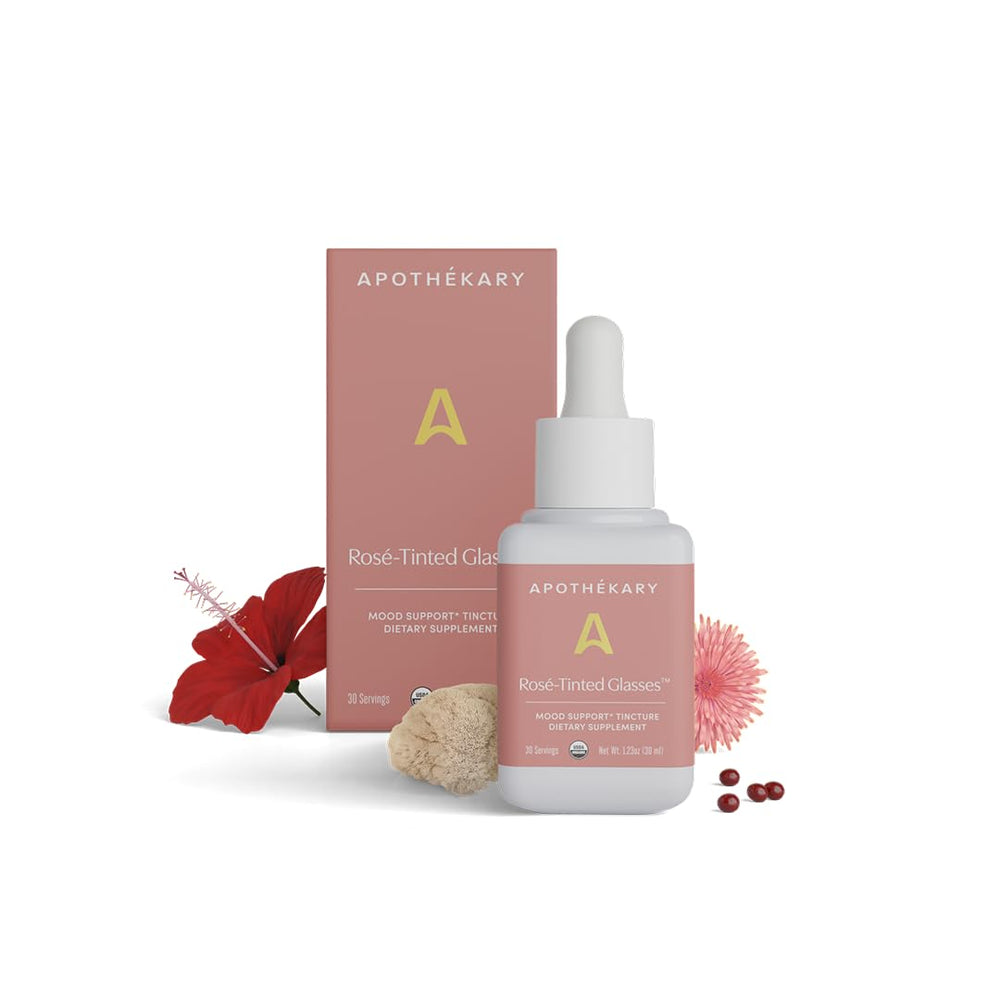 Apothékary Rosé-Tinted Glasses bottle pour shows a zero-proof mood balance option.