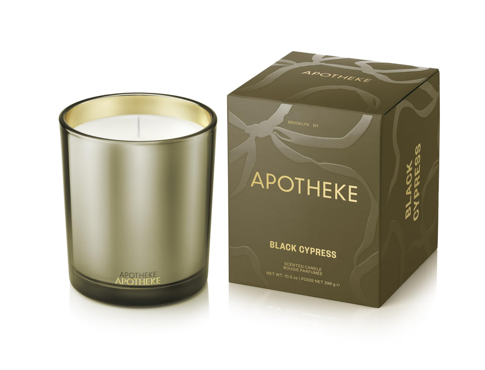 APOTHEKE Black Cypress 10.5 oz soy candle in a large gold jar