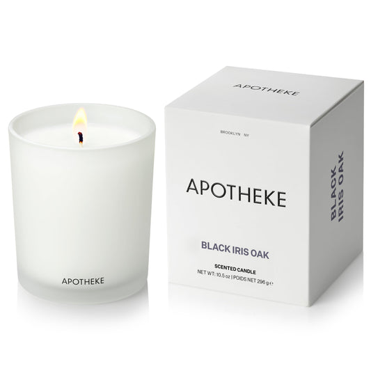 APOTHEKE Black Iris Oak scented candle in a large white 10.5 oz jar.