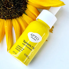 APTO Turmeric Oil with Rosemary droplet application shows fast absorption.