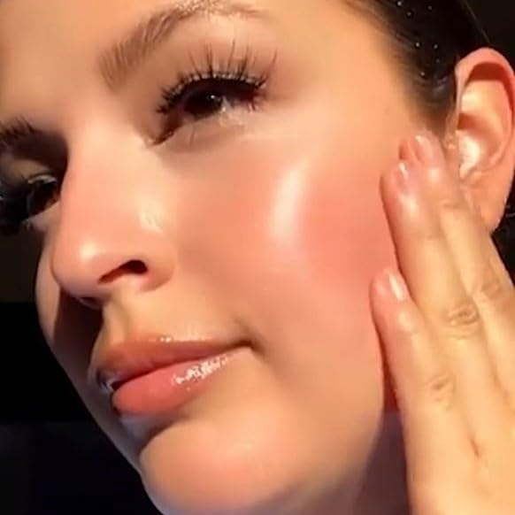 APTO Turmeric Oil with Rosemary in-use scene suggests morning skincare routine.