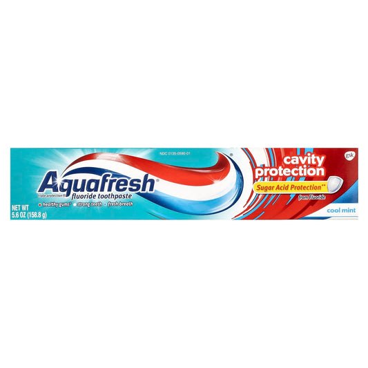 Close-up of Aquafresh toothpaste tube with mint paste