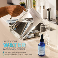 AquaTru water filtration system with mineralized water in a glass