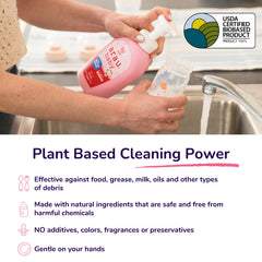 Baby bottles, pacifiers, and toys being washed with plant-based formula
