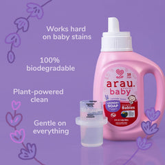 Baby clothes in washing machine with gentle detergent