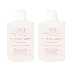 Ardell LashTite adhesive clear bottle close-up, fast-drying and gentle for sensitive eyes.