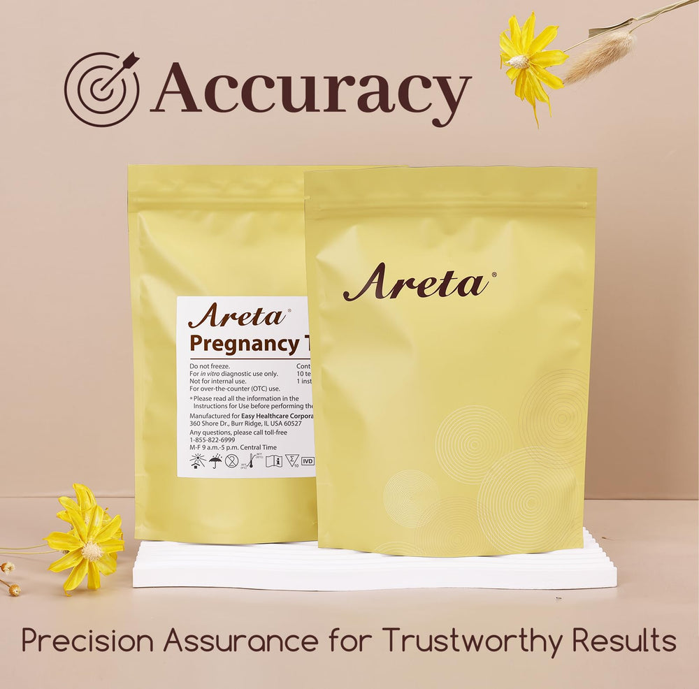 Areta test strips being dipped into urine for 5-10 seconds