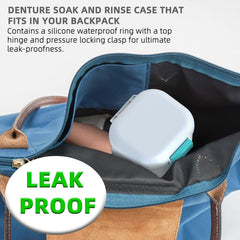 Denture bath cup with lid open and strainer