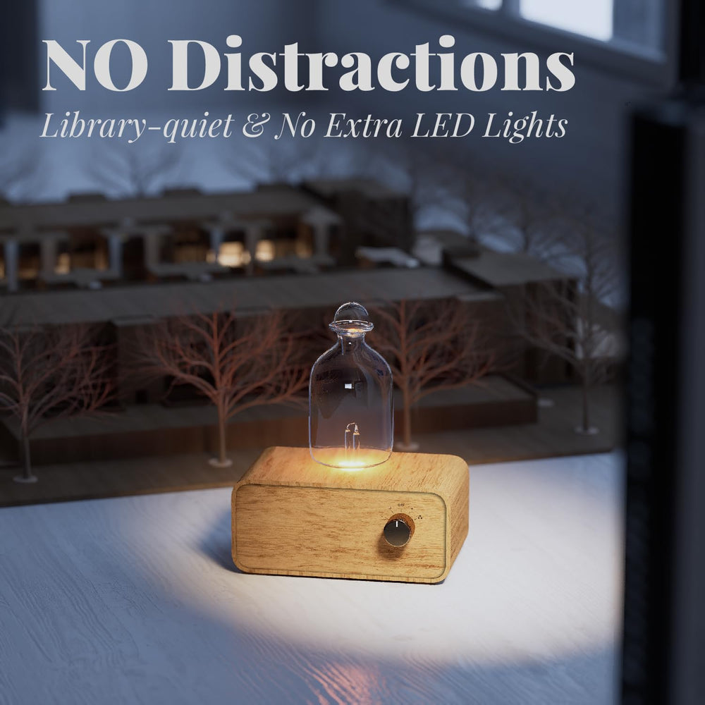 Compact travel-ready aromatherapy diffuser in glass and wood