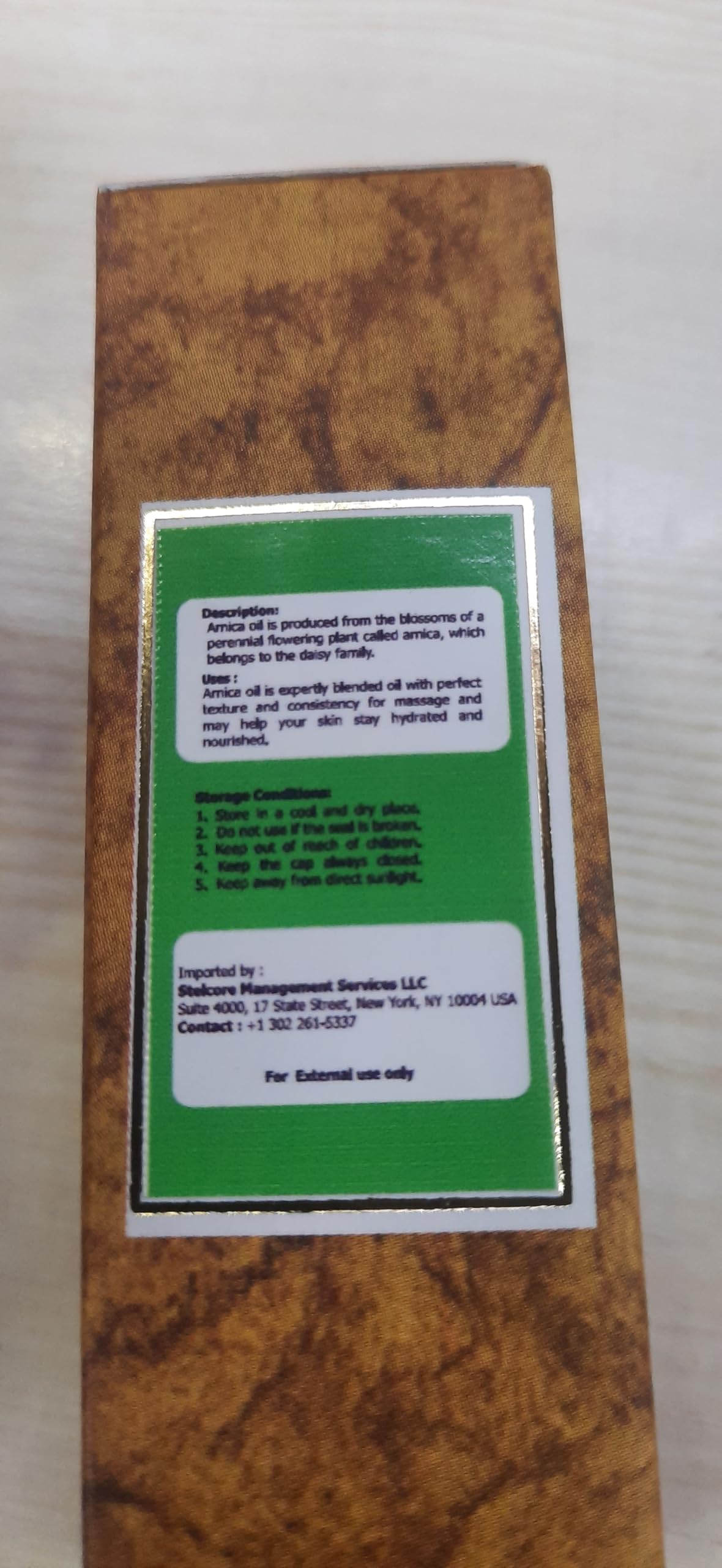 Cold-pressed undiluted Arnica essential oil for aromatherapy