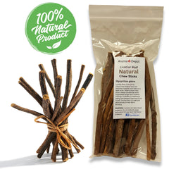 Single 6.5-7 inch licorice root chew stick held in hand
