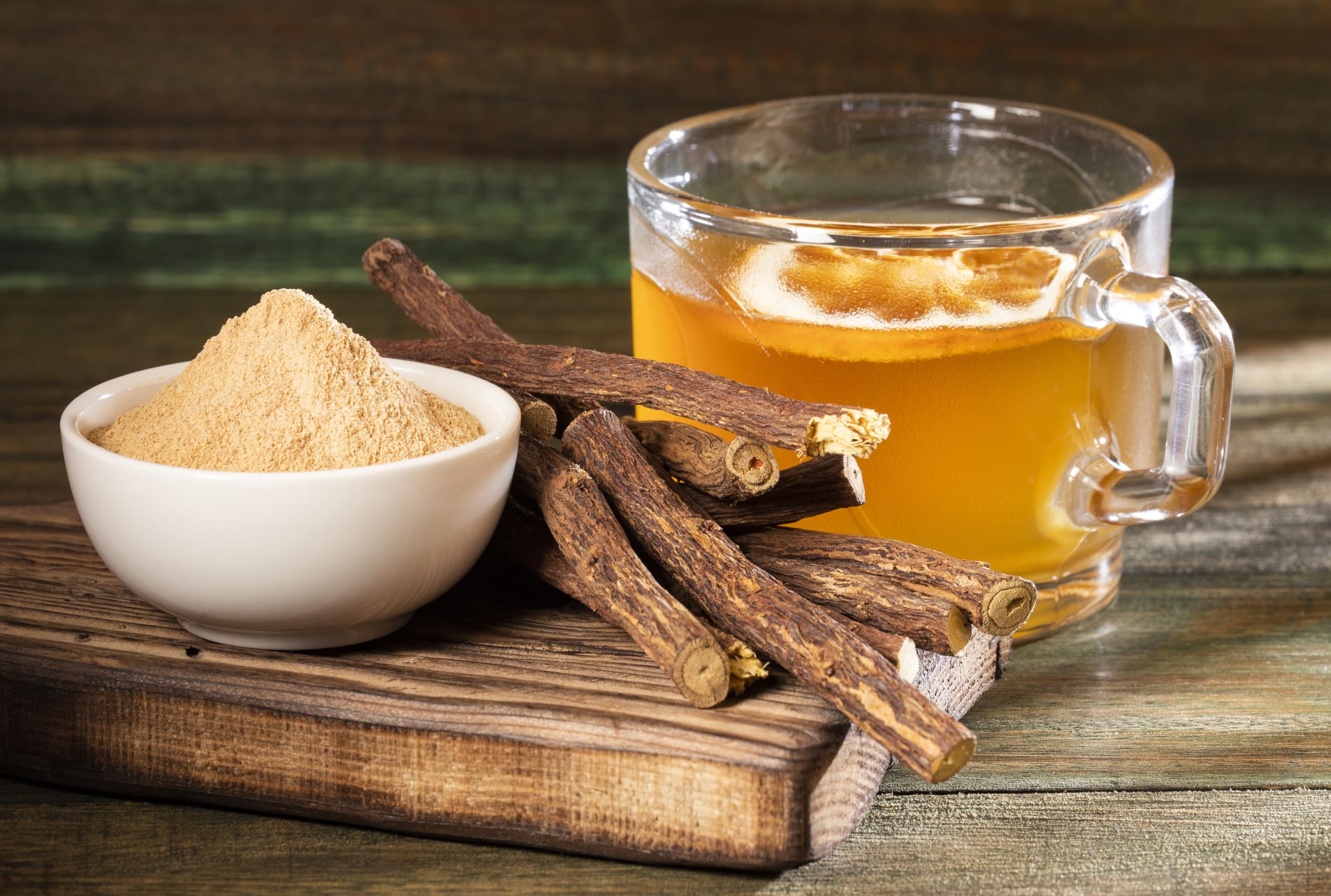 Unwrapped licorice root chew sticks showing strawberry infusion