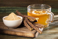 Unwrapped licorice root chew sticks showing strawberry infusion