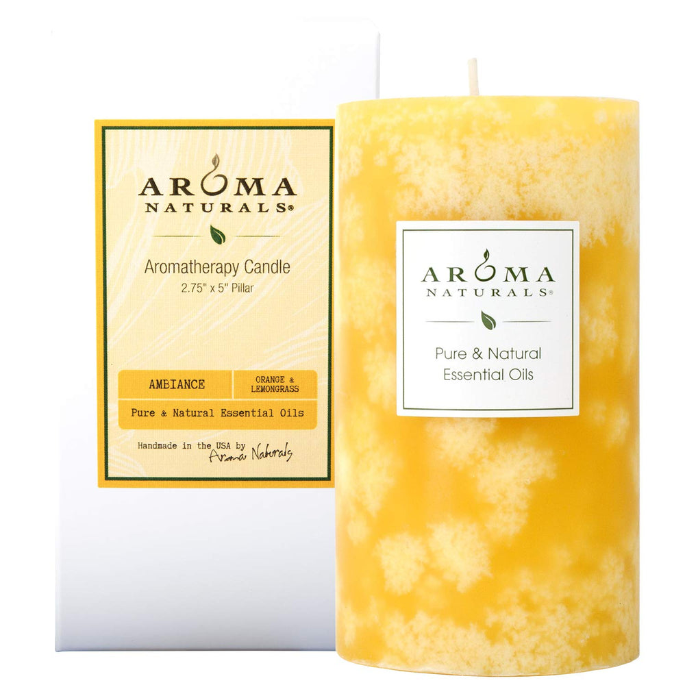 Orange and lemongrass scented pillar candle, 2.75 x 5 inches, yellow