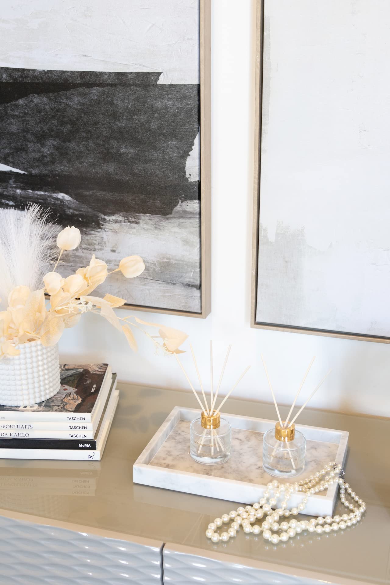 Aroma360 Dream On Paris diffuser in bedroom creates serene ambience and soft fragrance.