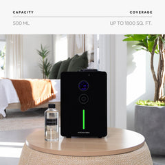 Aroma360 VanGogh360 diffuser in a living room with hotel-inspired aroma.