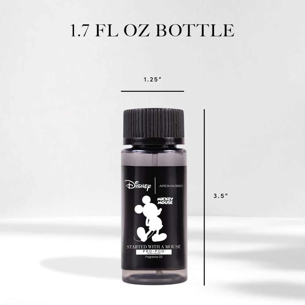 Close-up of Started With A Mouse fragrance oil bottle with lemon and bergamot notes