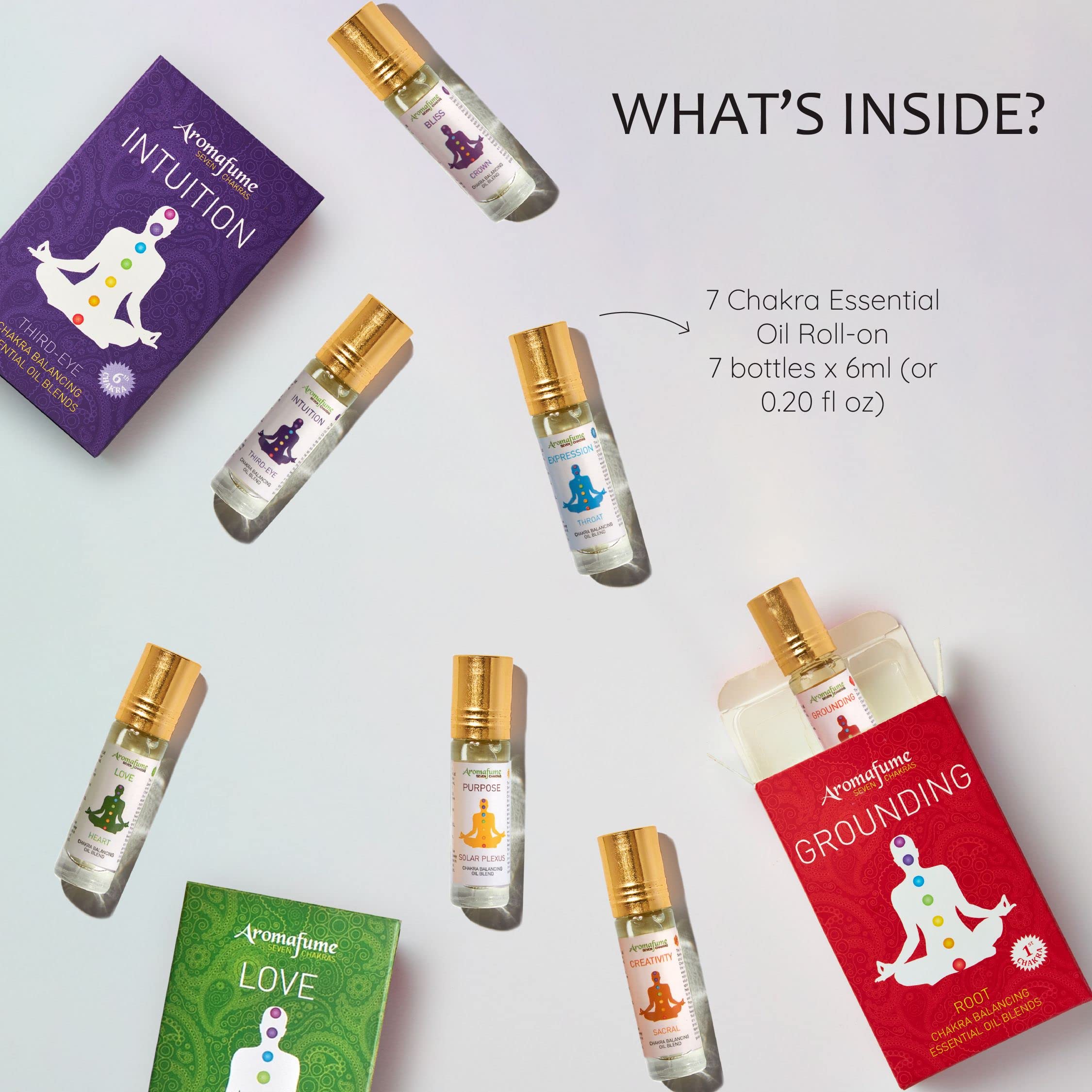 Seven chakra essential oil roll-ons lined up for display