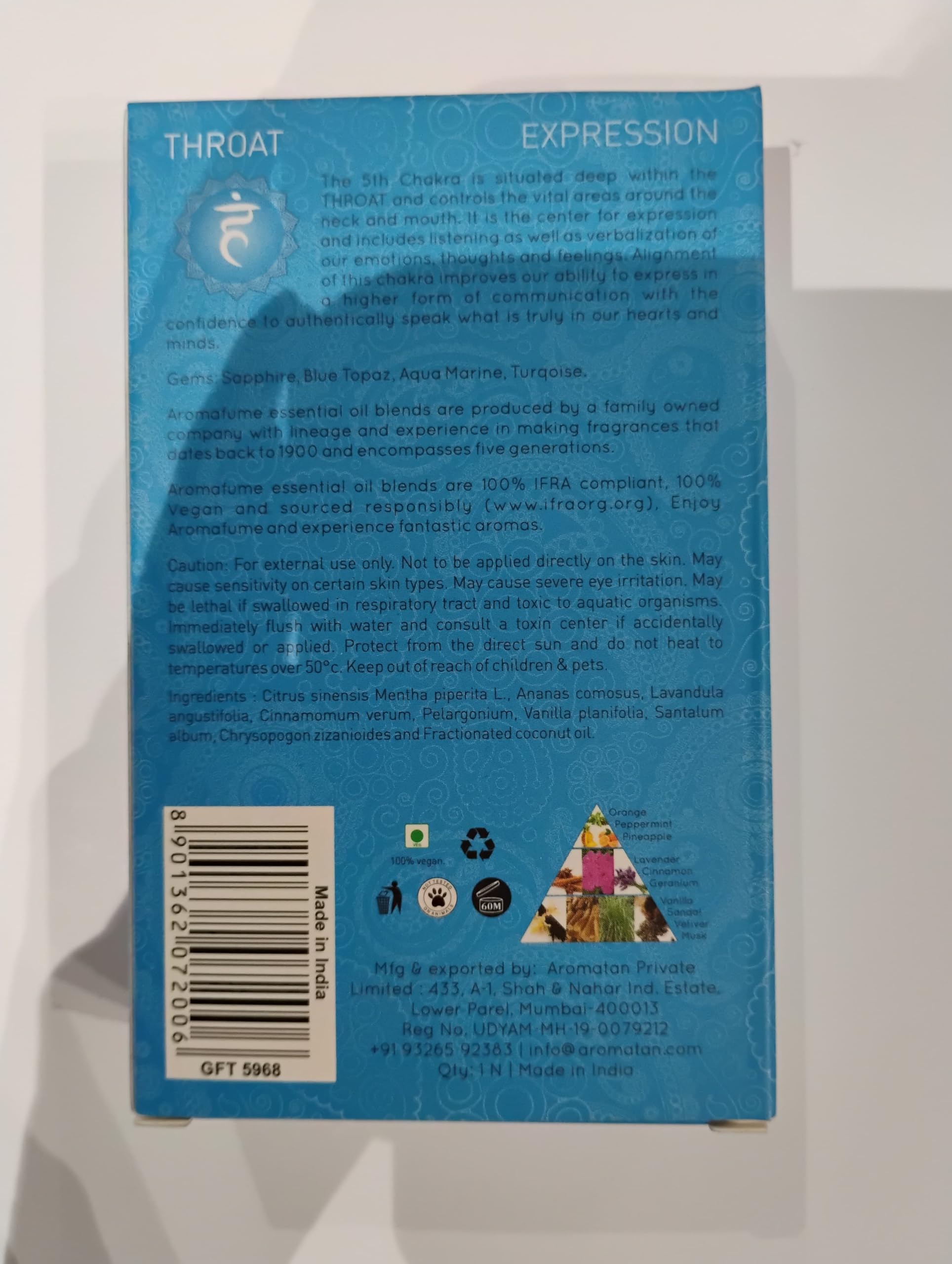 Natural ingredients arranged around the bottles