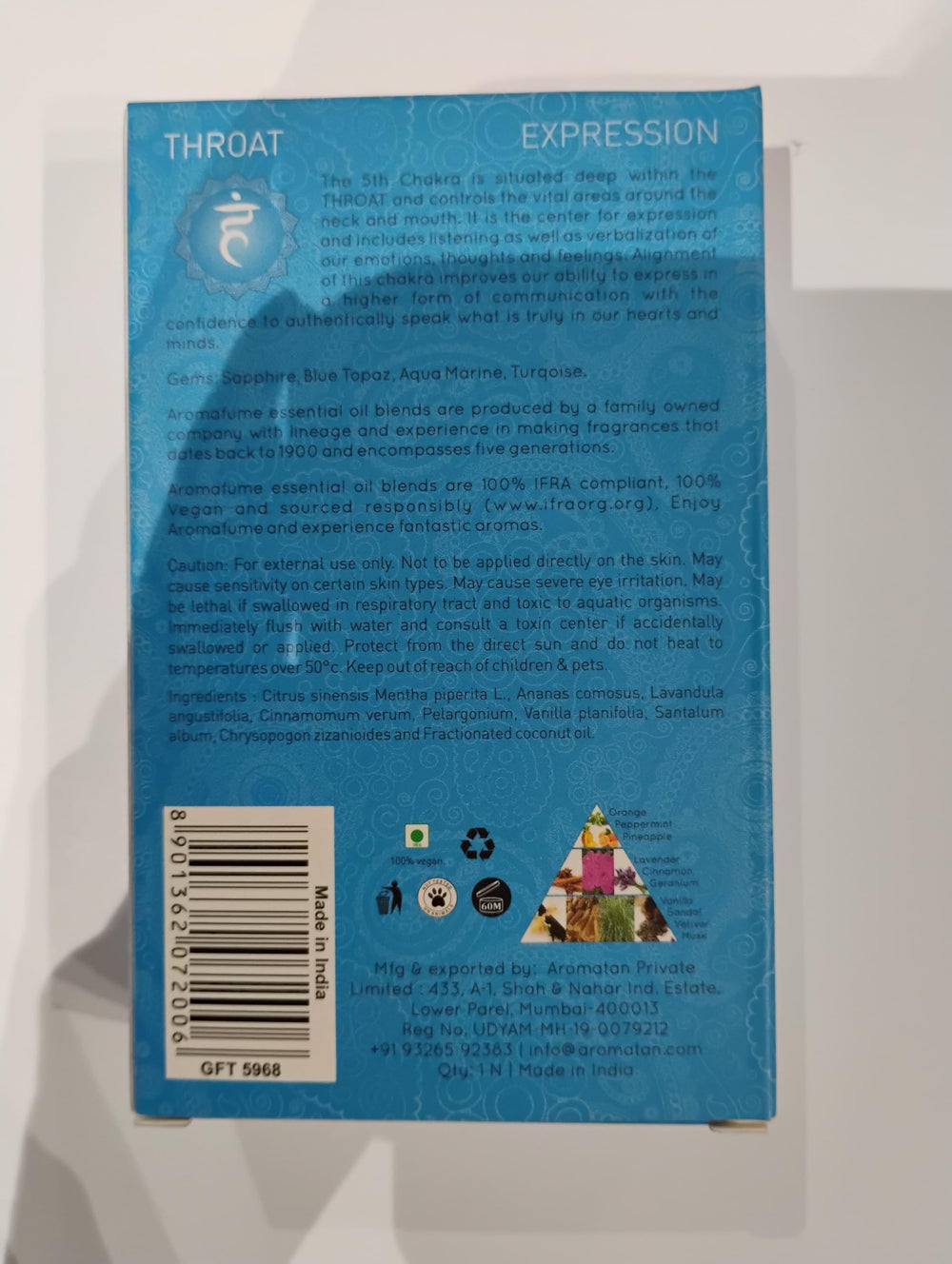 Natural ingredients arranged around the bottles