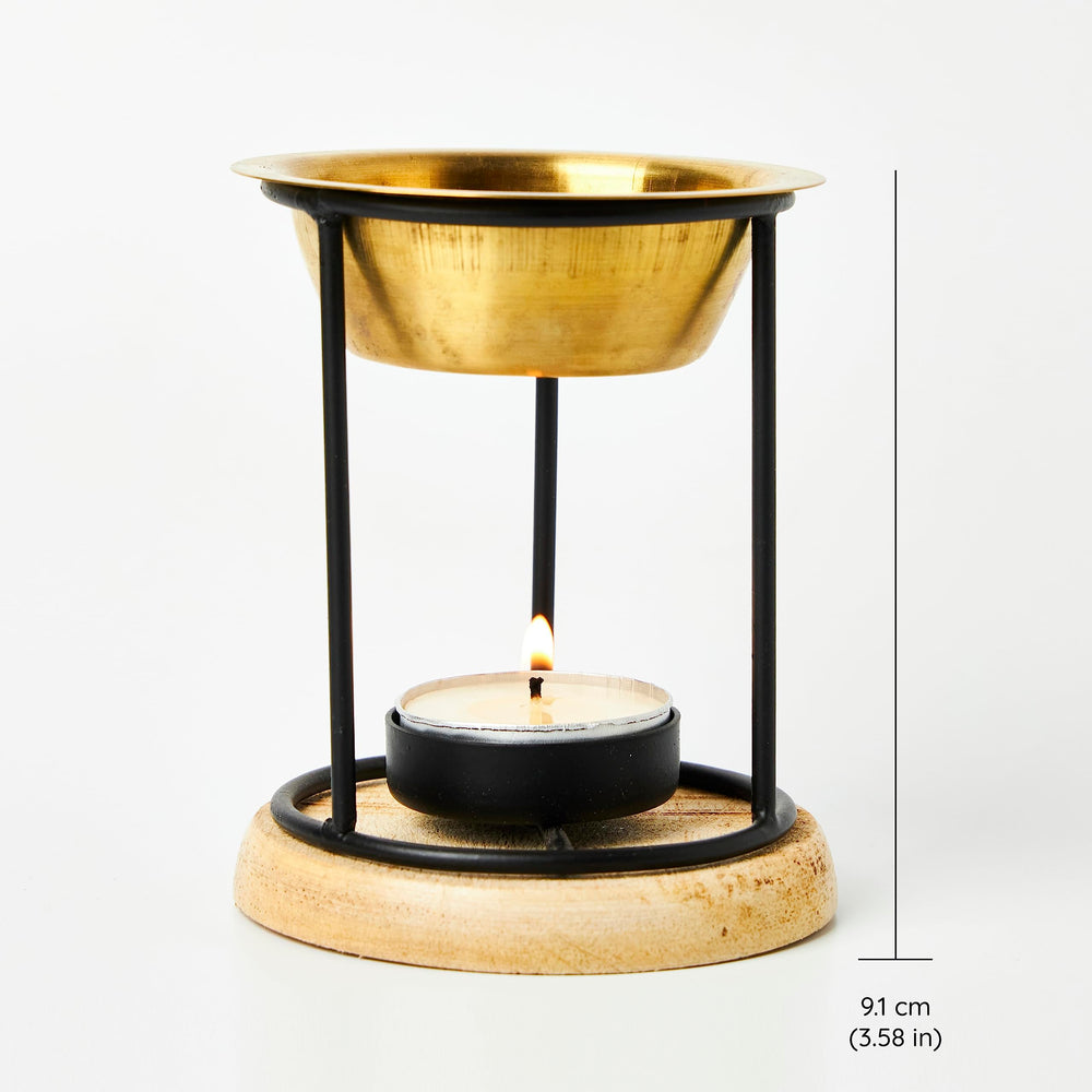 Aromafume exotic burner wrought-iron base complements rustic decor while diffusing oils.