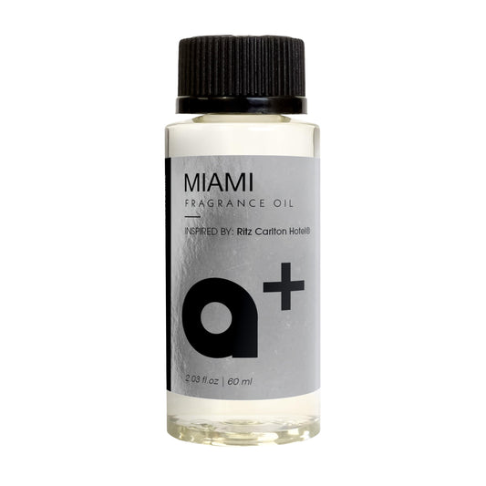 Aromar+ fragrance oil bottle inspired by Ritz Carlton Miami, luxury hotel scent.